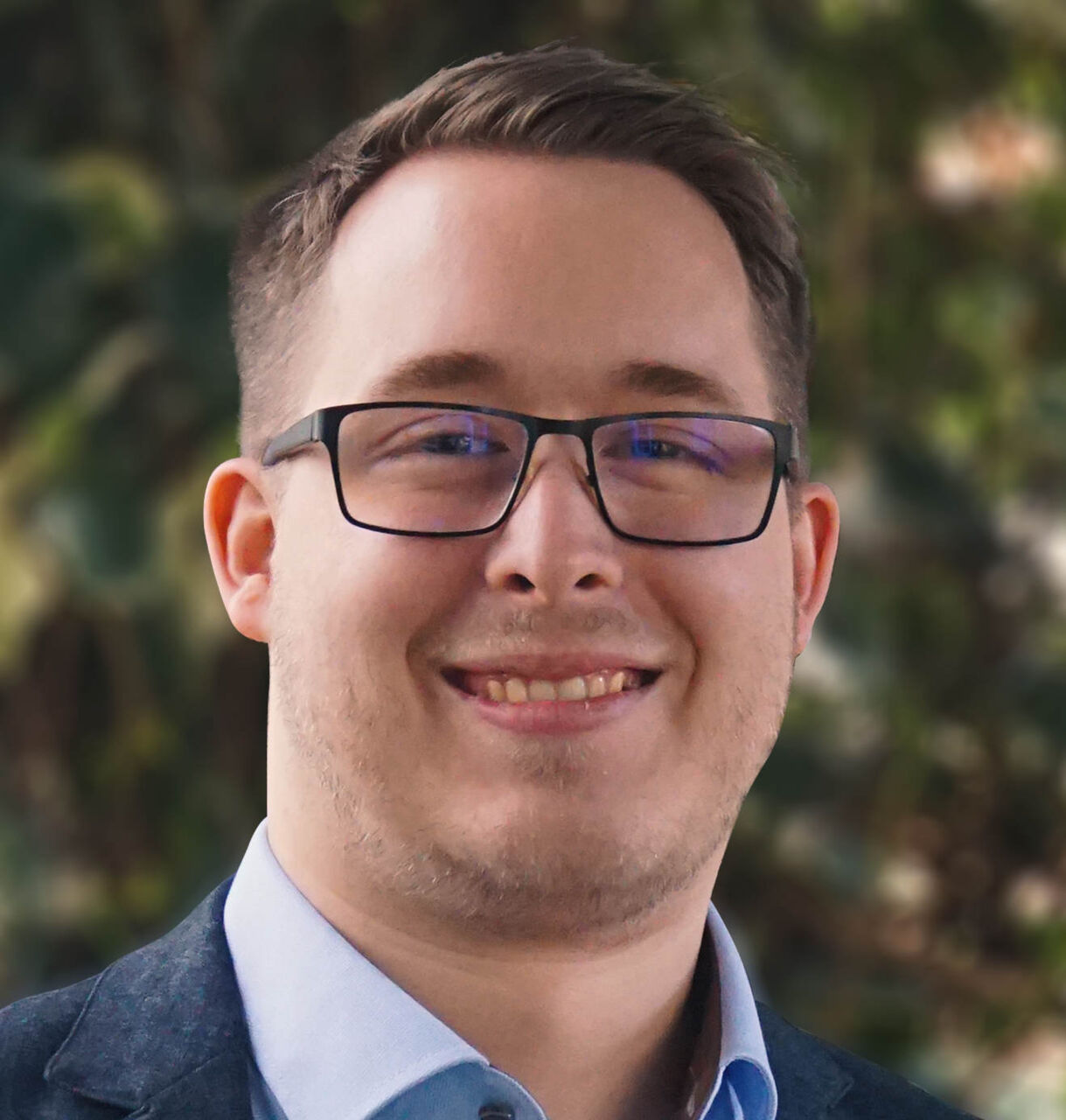 世界技能冠军信托(WorldSkills Champions Trust)欧洲代表丹尼尔·克里斯托弗森(Daniel Christophersen)的肖像照片，他是一名IT顾问。